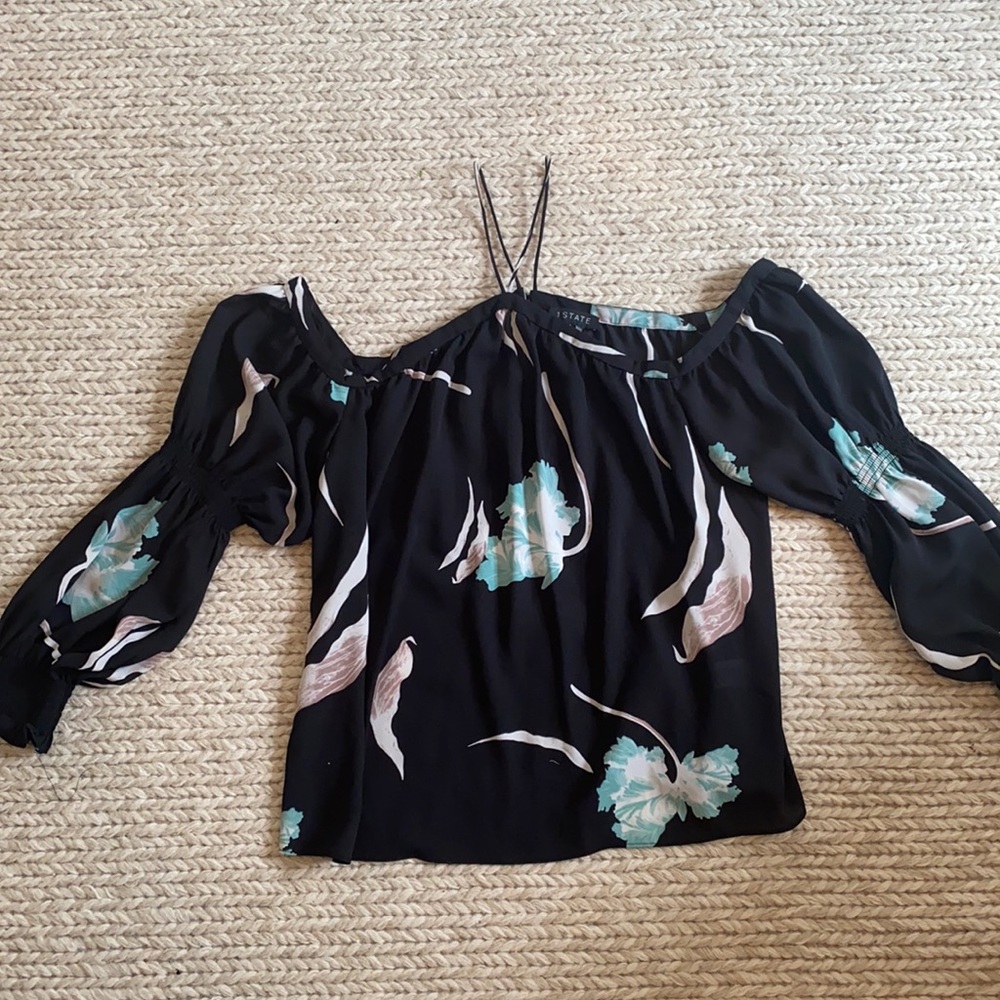 Cold shoulder black blouse with floral detail